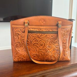 Never before used Patricia Nash mid size brown leather purse